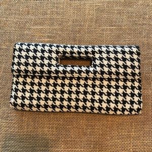 Houndstooth clutch.